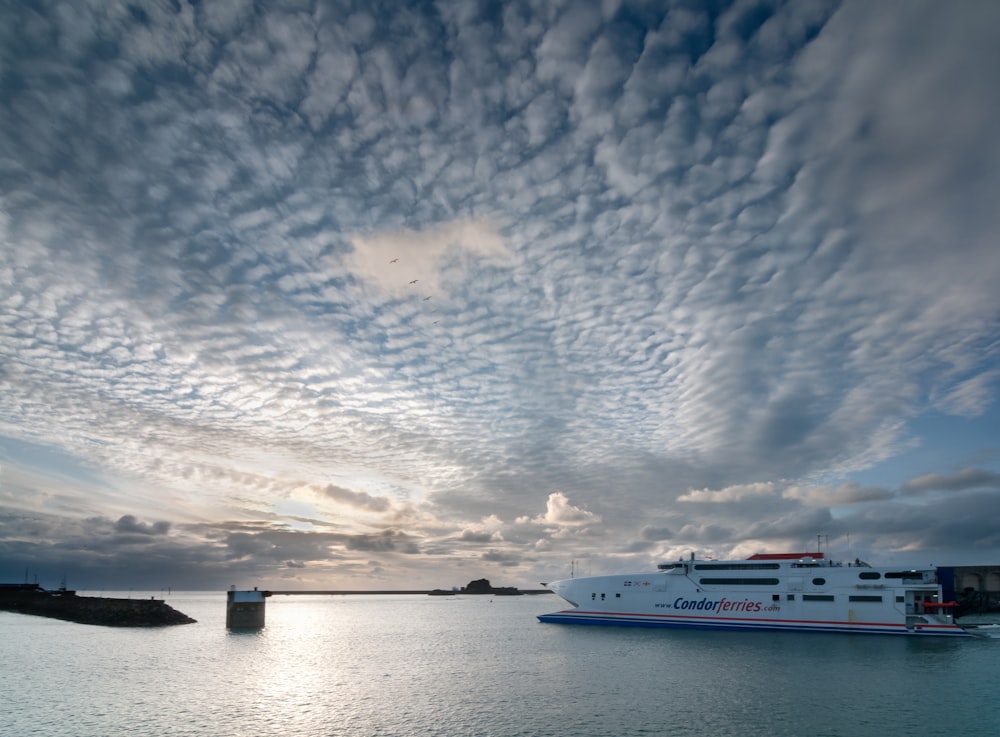 a large boat floating on top of a large body of water