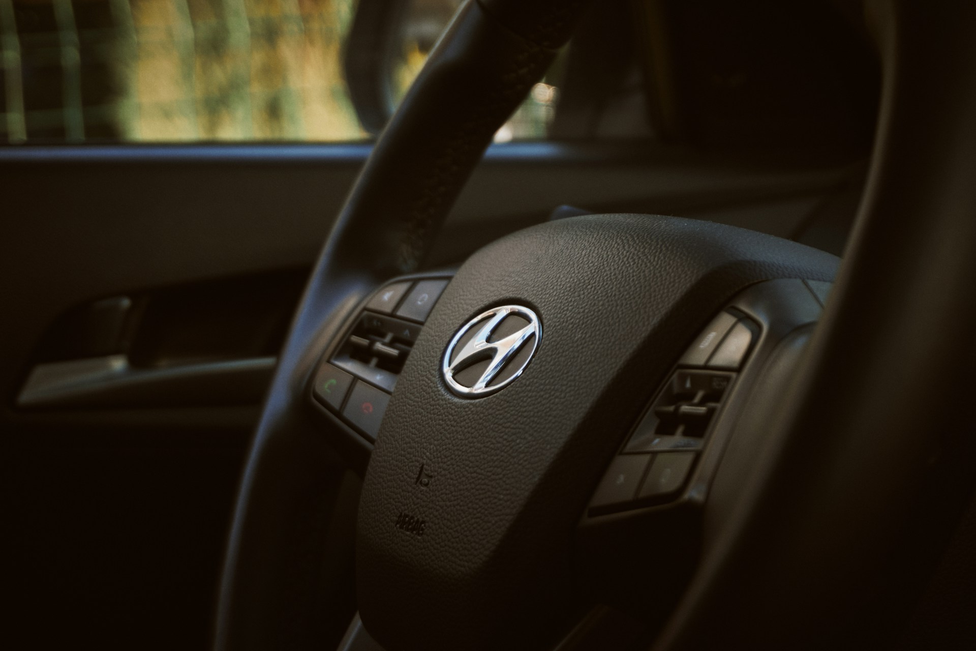 woman wearing yellow long-sleeved dress under white clouds and blue sky during daytime