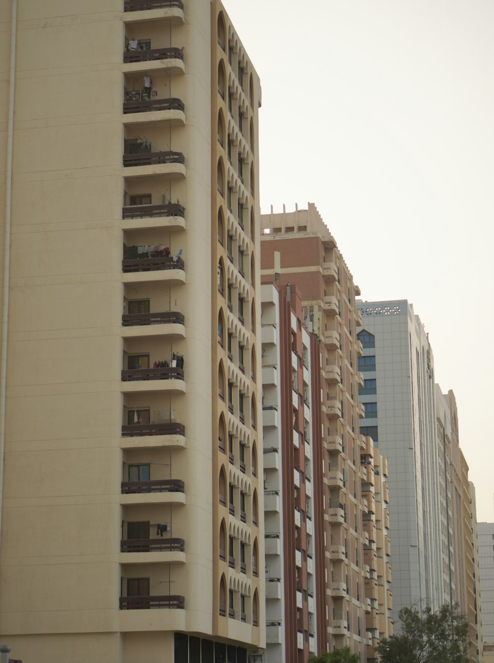 a tall building with balconies and balconies on it