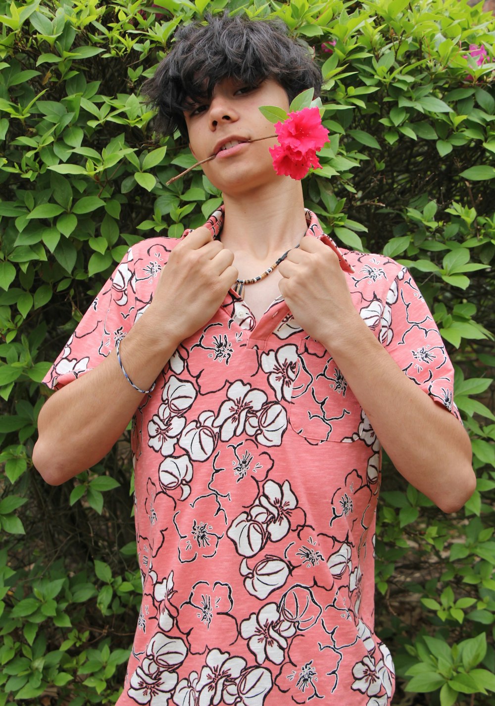 a woman with a flower in her hand