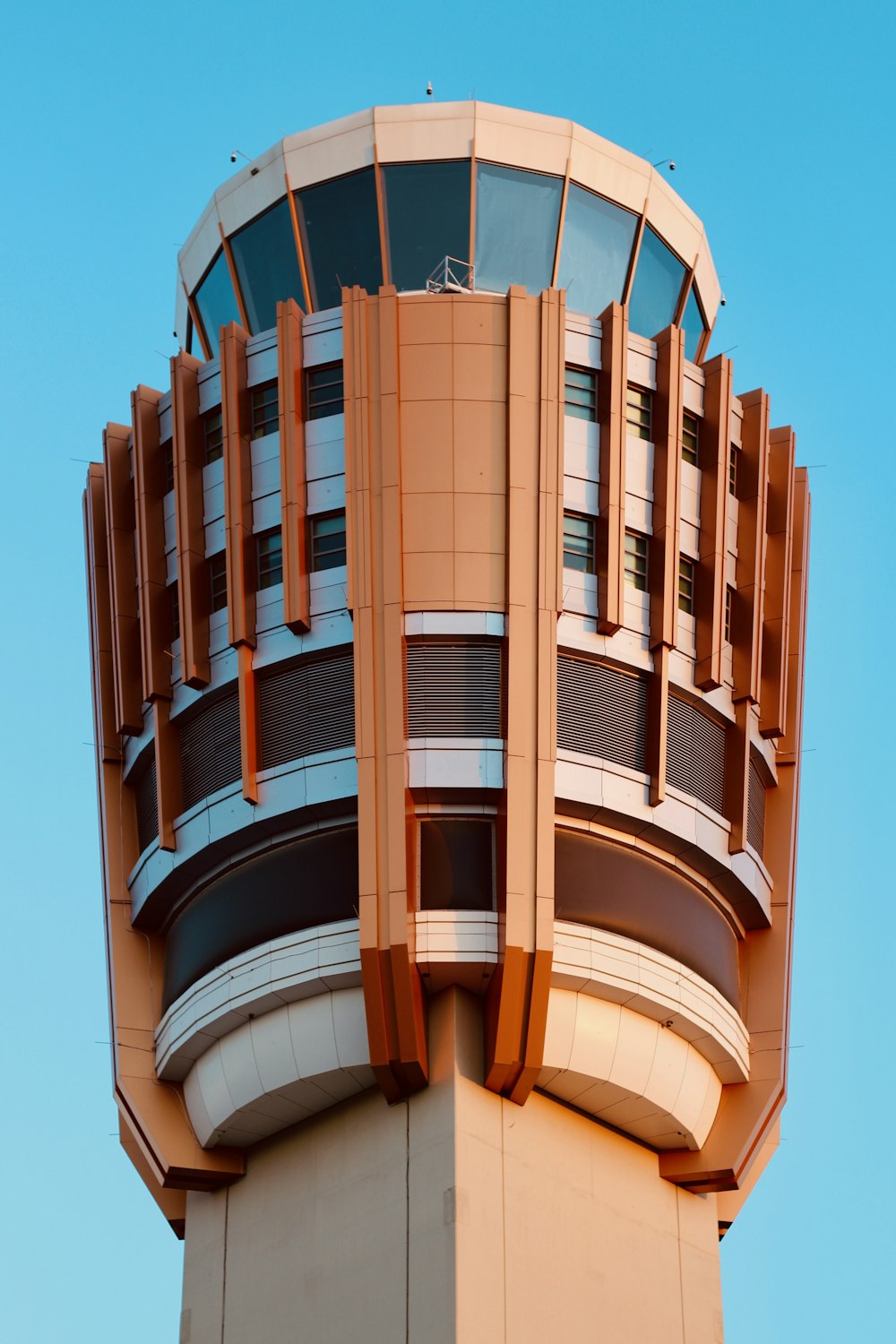 a tall tower with a clock on the top of it