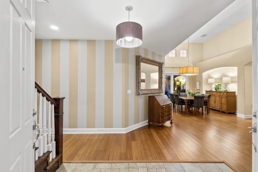 A before-and-after comparison of a renovated room showcasing new flooring and decor.