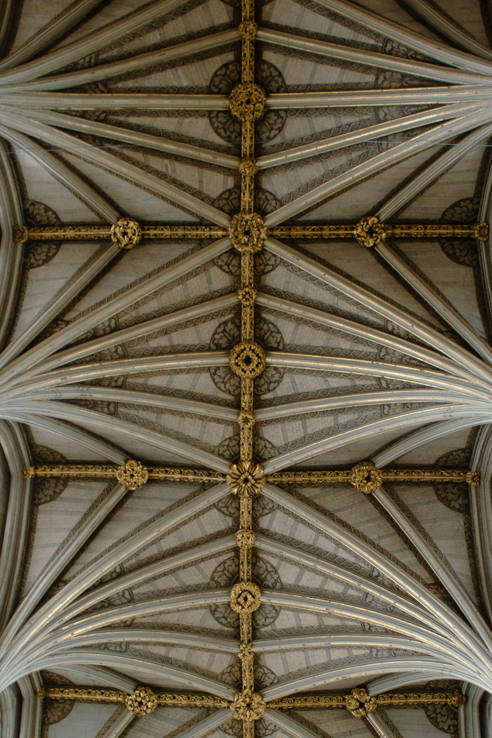 the ceiling of a large cathedral with intricate designs