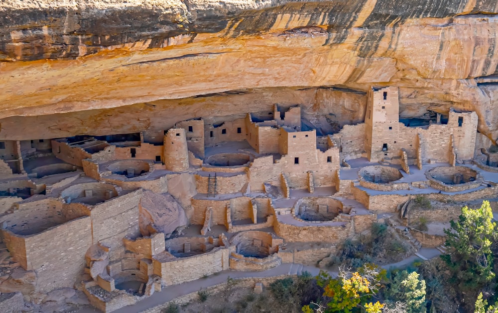 an aerial view of a cliff dwelling in a canyon