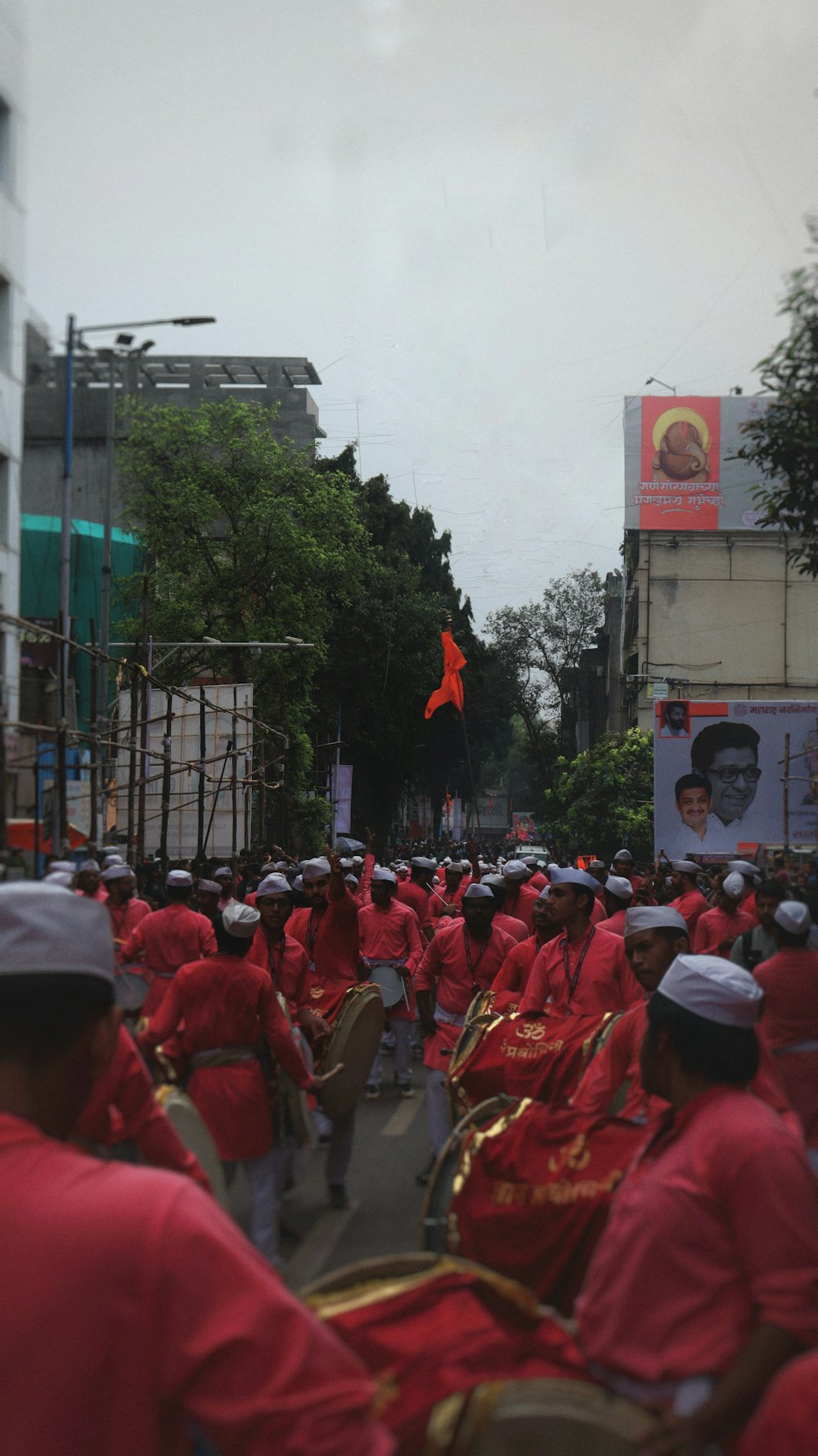 a large group of people in red outfits
