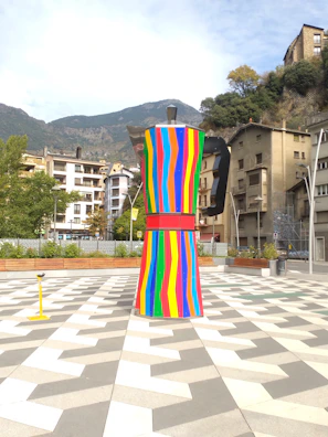 A vibrant shot of Plaza Botero showcasing Fernando Botero's oversized sculptures under a bright sky.