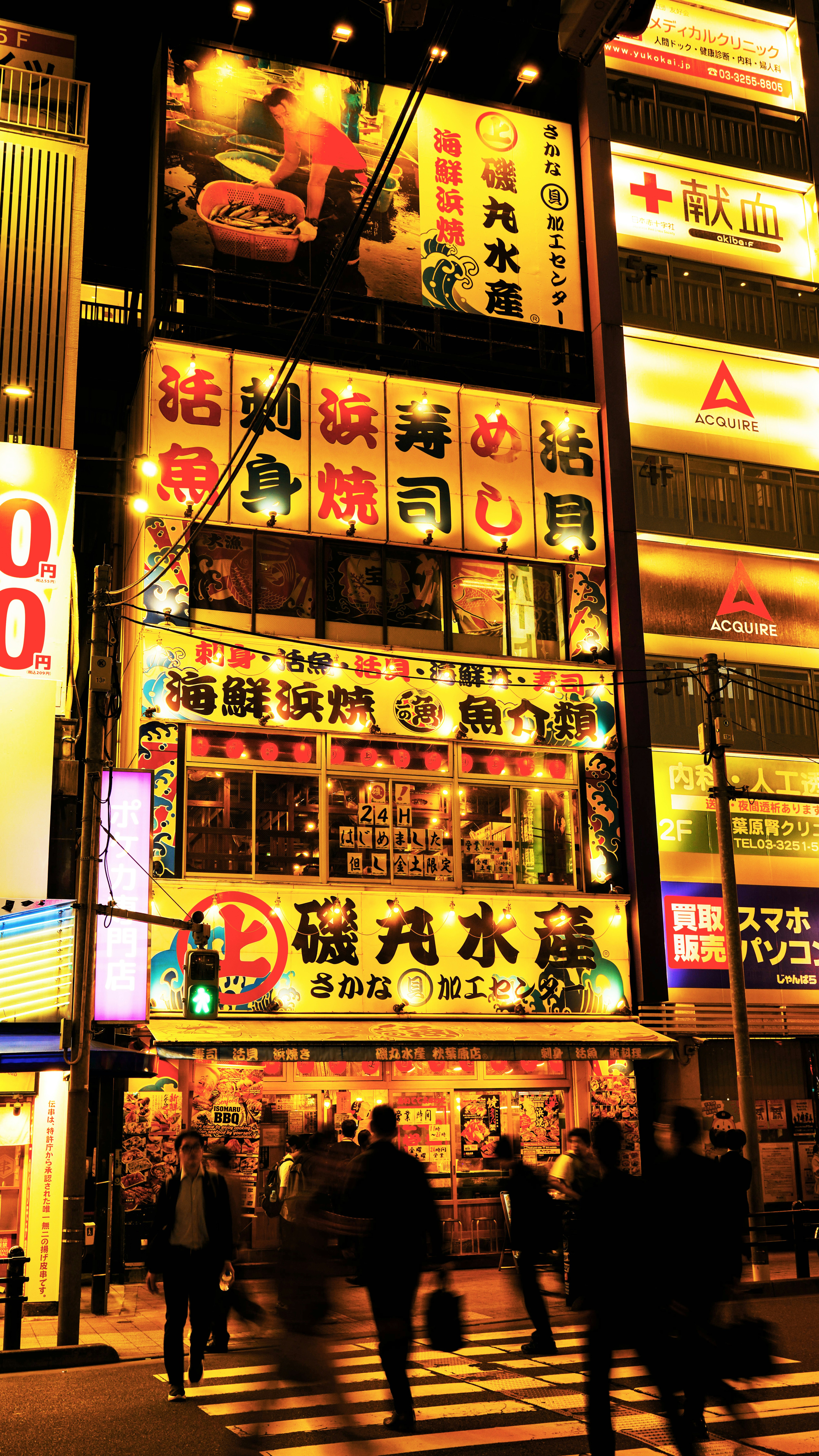 a large building that has a lot of signs on it