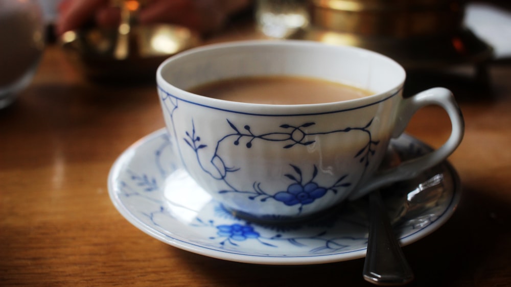 a cup of coffee sitting on top of a saucer