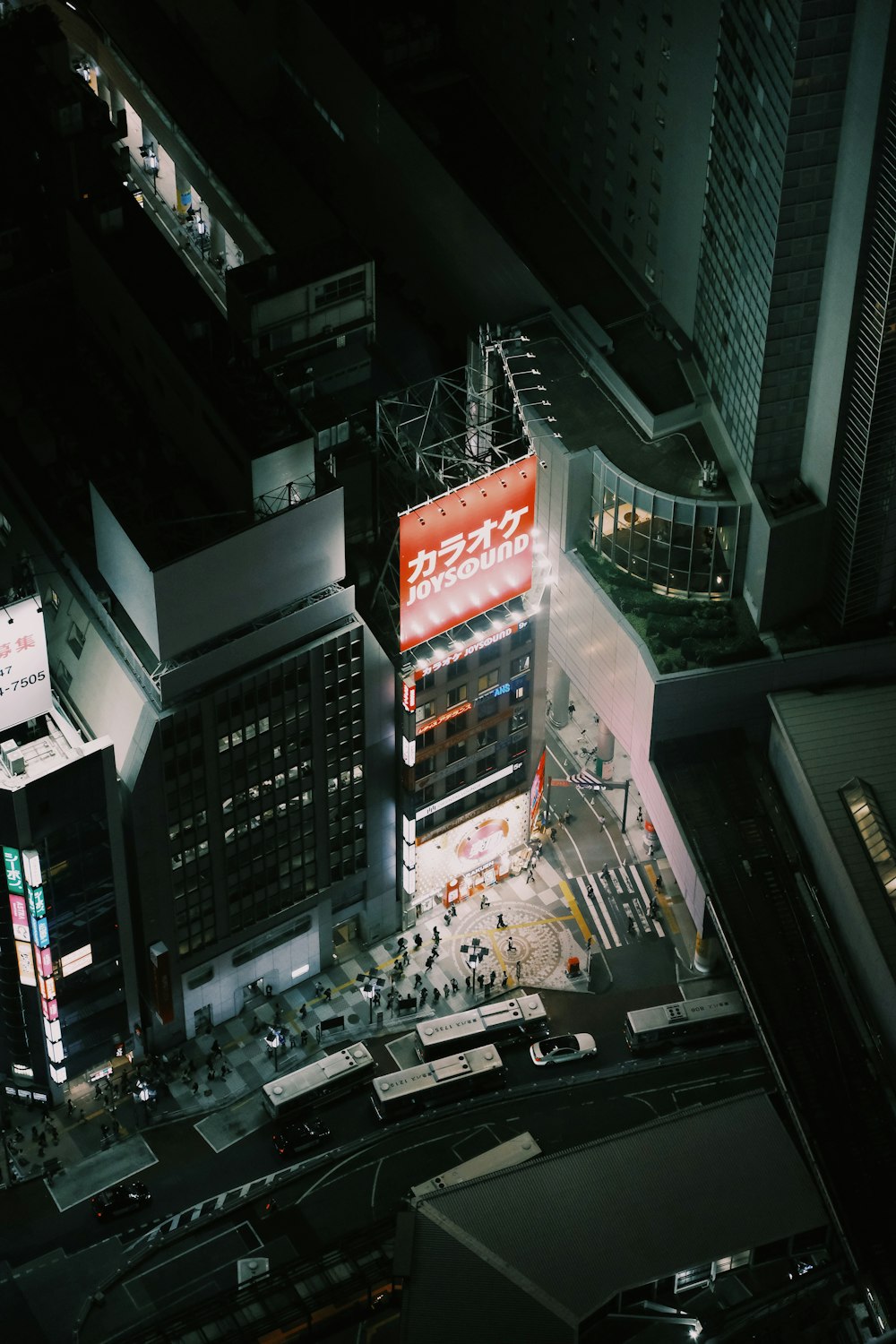 an aerial view of a city at night