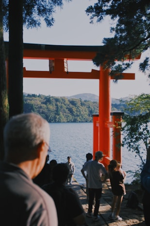 A vibrant team of multilingual guides showcasing the beauty of Okinawa.