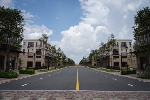 Elegant residential buildings lining Gulan Street under a clear blue sky.
