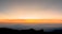 A serene landscape with a sunrise, symbolizing new beginnings and clarity.