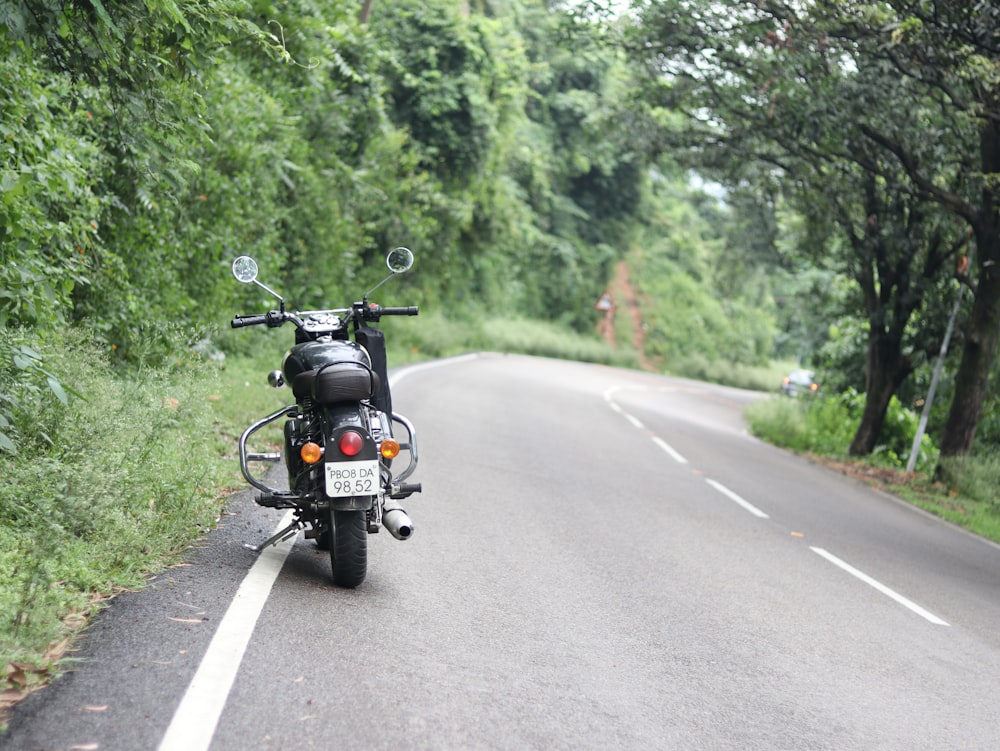 a motorcycle parked on the side of the road