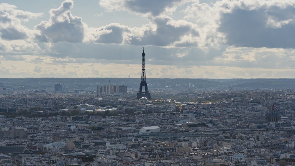 the eiffel tower towering over the city of paris