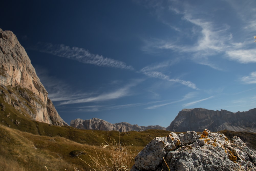 a rock outcropping in the middle of a field