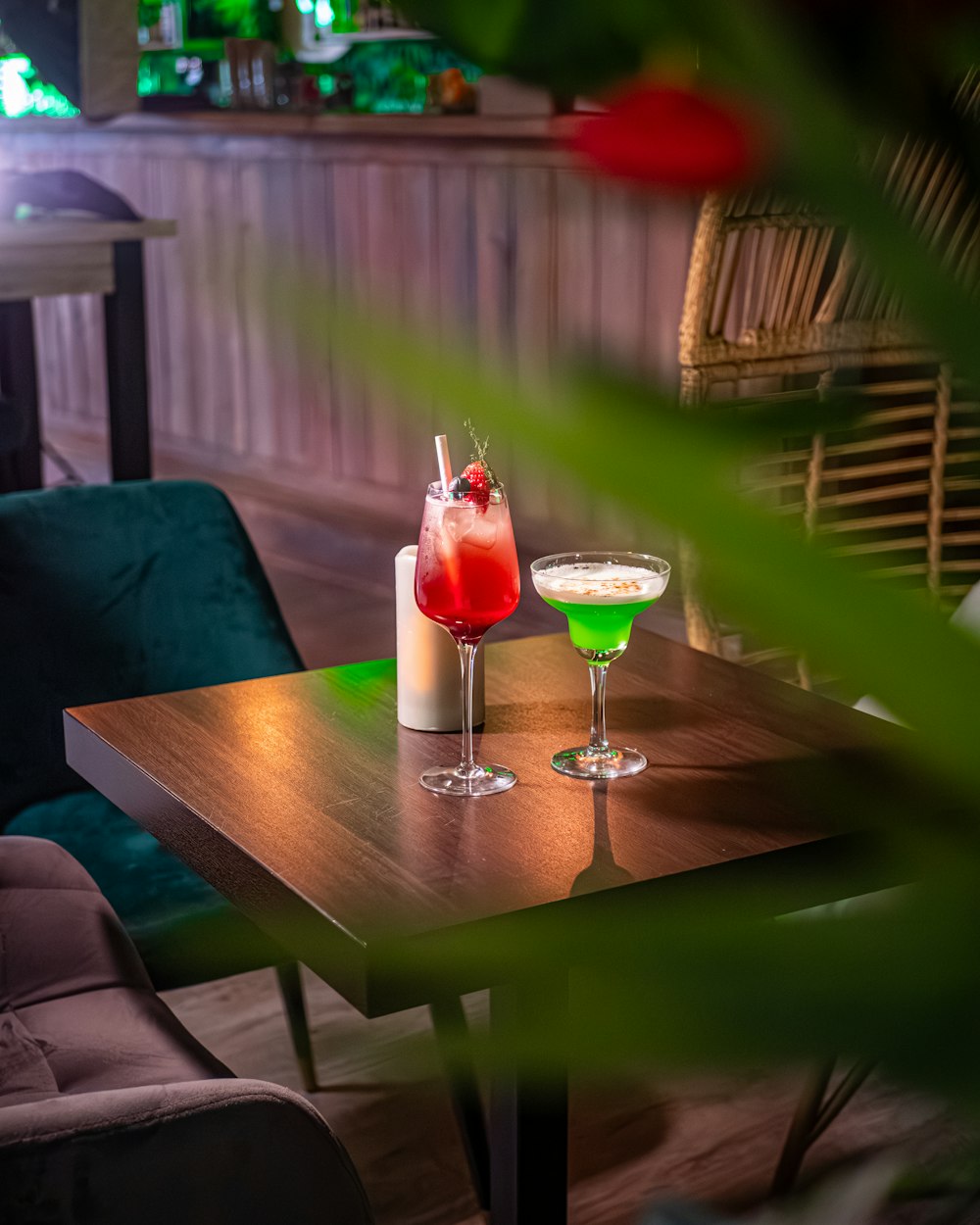 two cocktails on a table in a restaurant