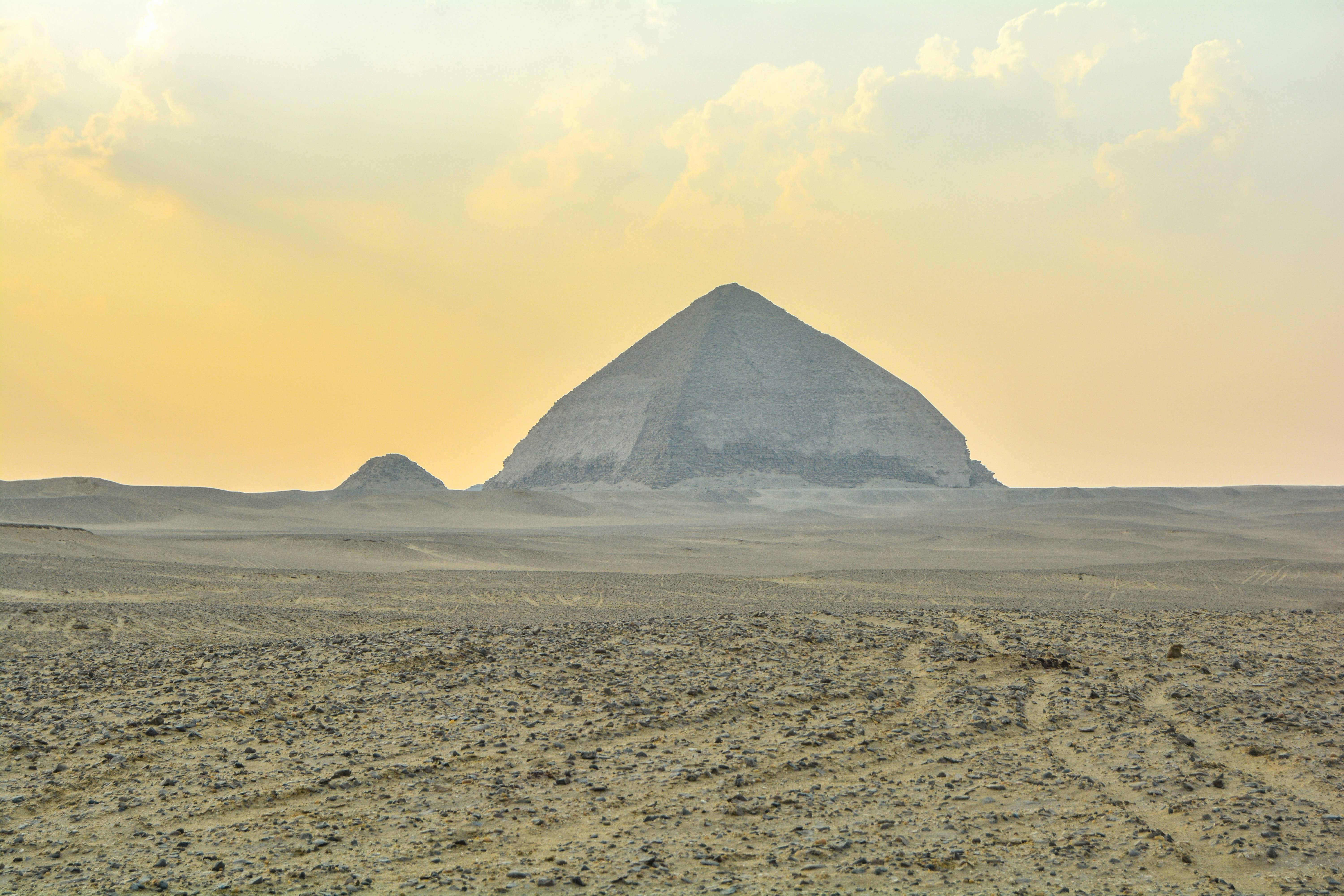 A large pyramid in the middle of a desert