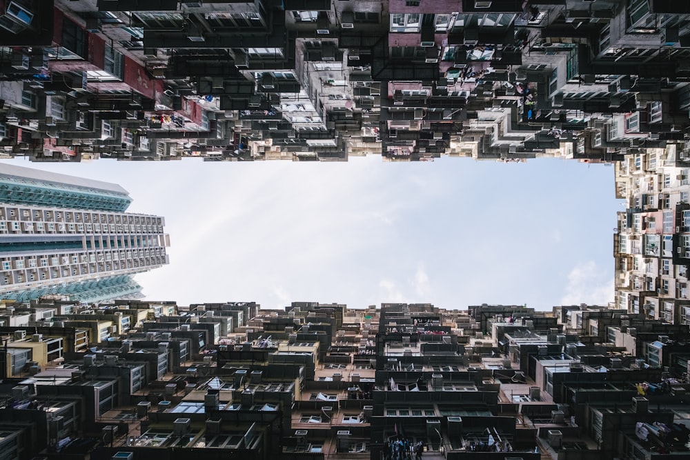 a group of buildings with a sky background