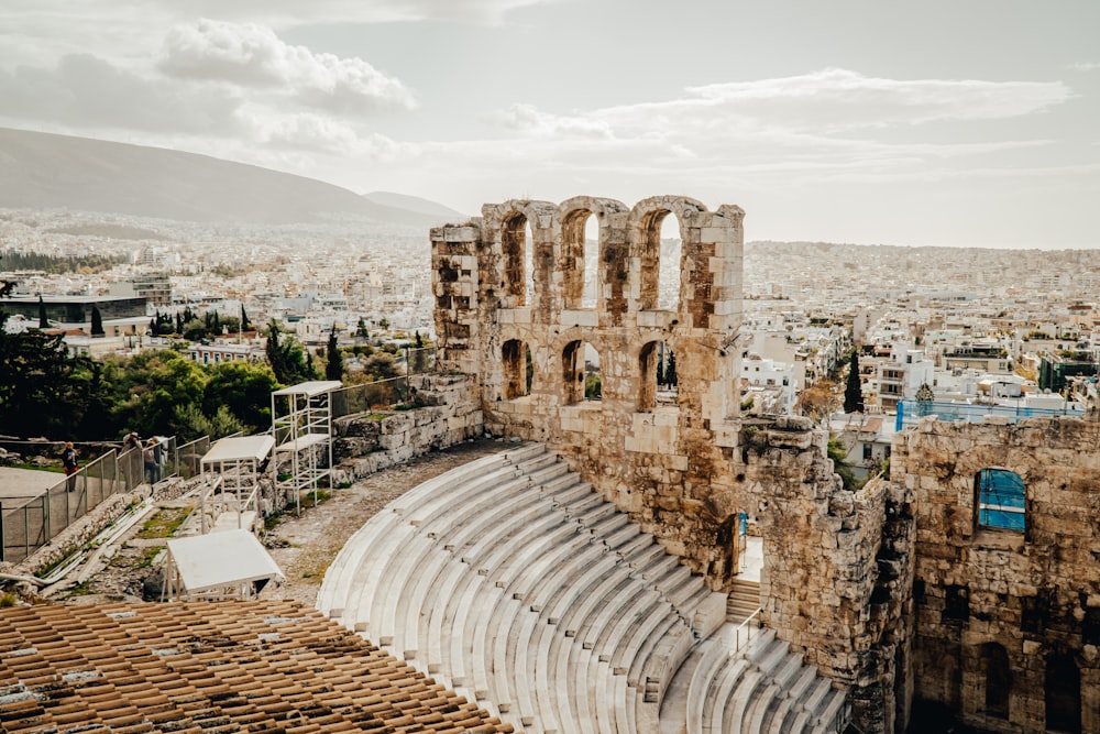 a view of a roman amphit in the middle of a city