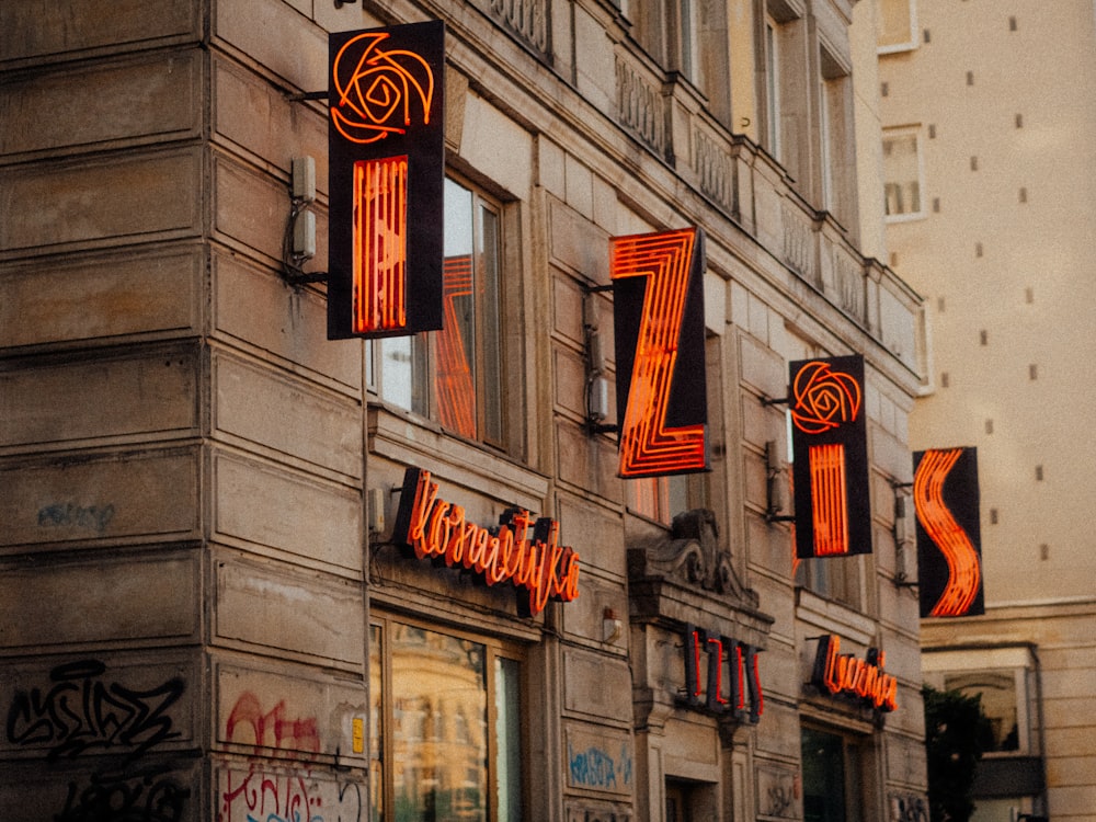 a building that has some neon signs on it