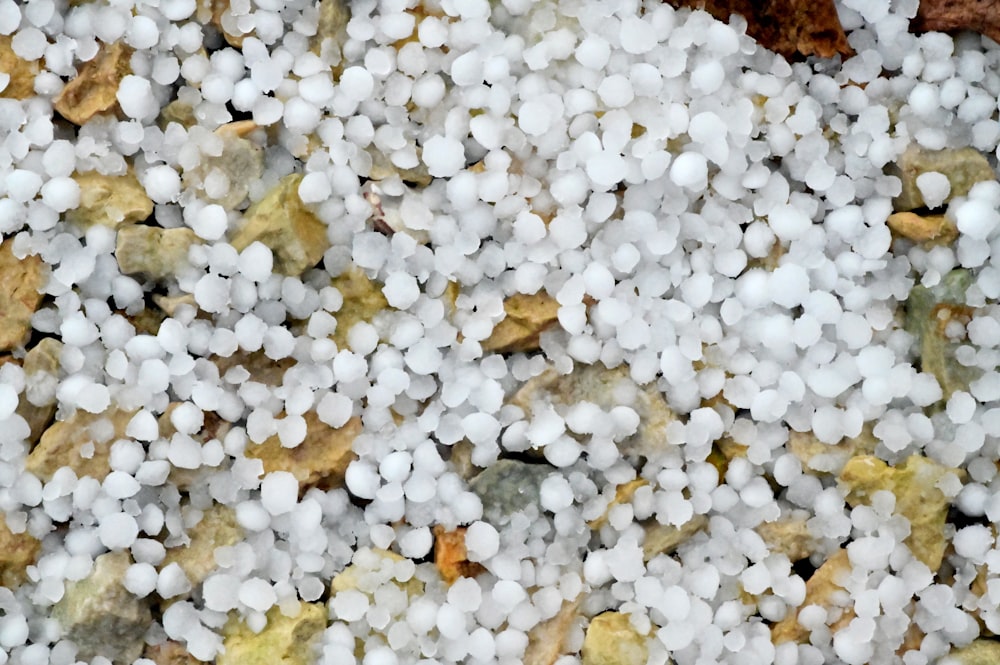 a close up of a mixture of rocks and gravel