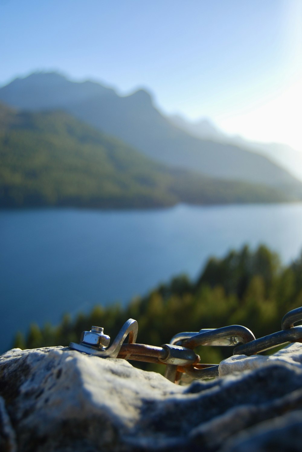 a chain that is sitting on a rock