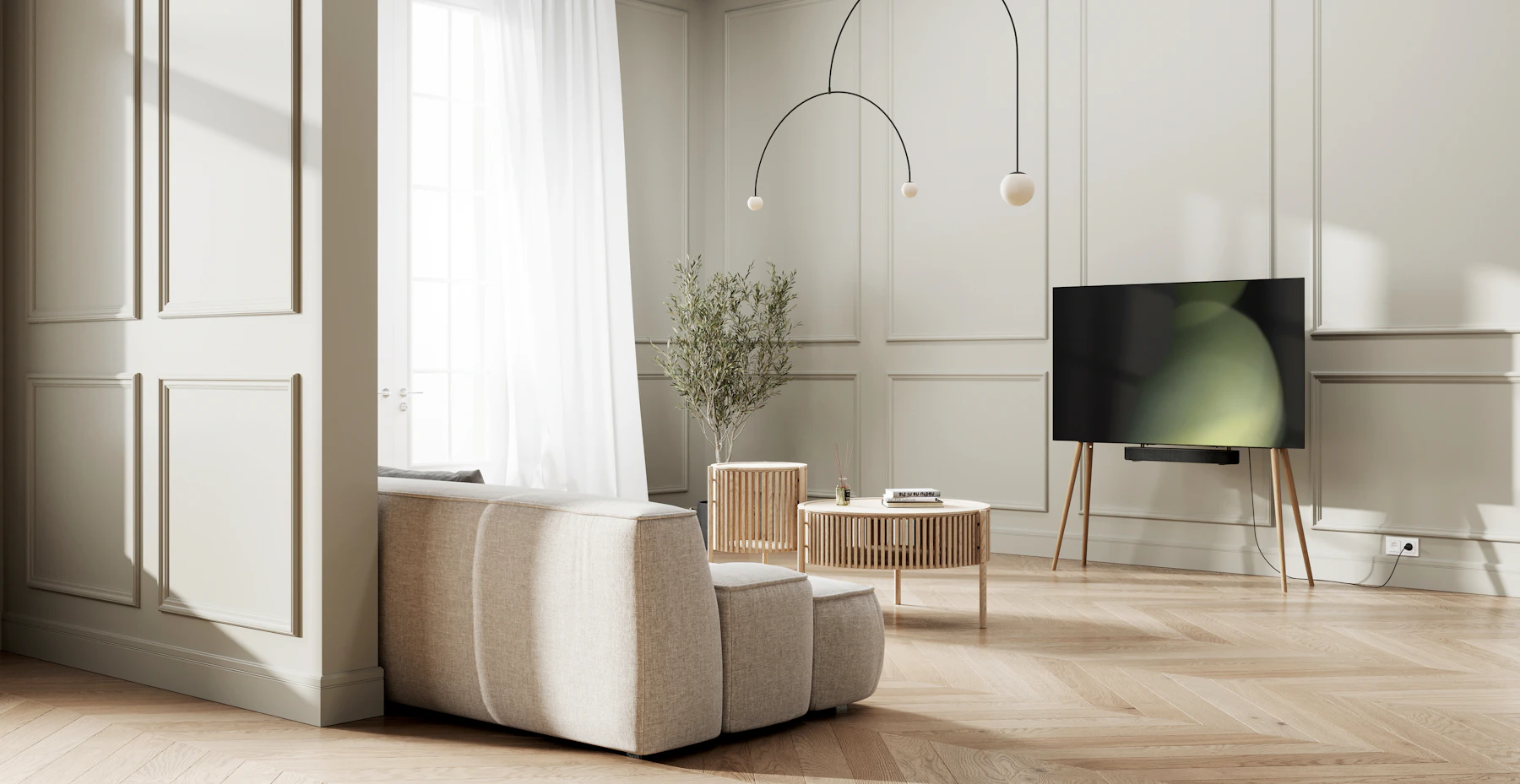 Large flat-screen TV mounted on a living room wall