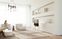 Spacious living room with minimalist design, neutral tones, and golden accents