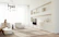 A bright, inviting small apartment living room styled with warm neutral tones and minimalist furniture.