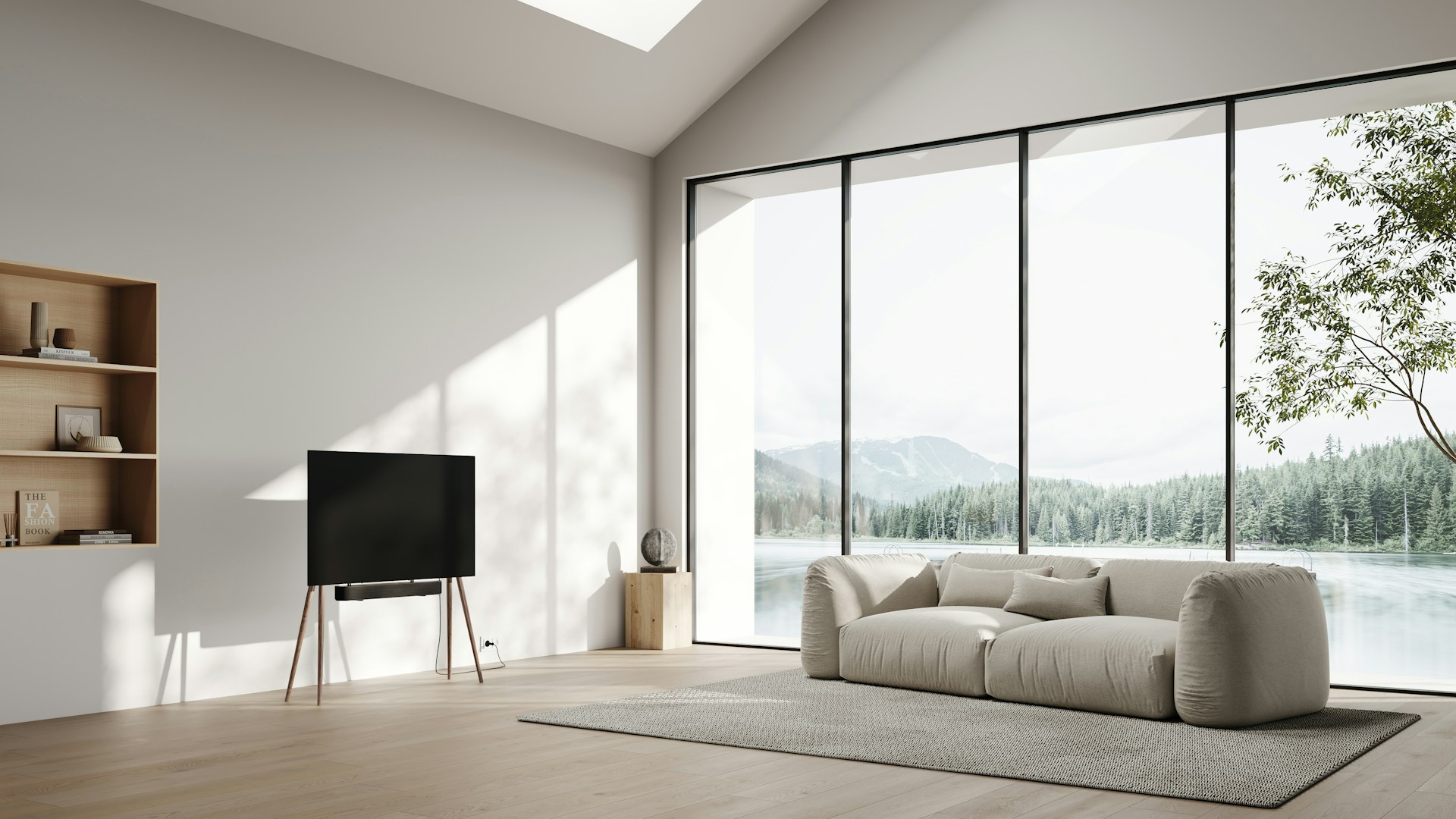A sleek living room bathed in natural light, featuring floor-to-ceiling windows dressed with custom, minimalist roller shades in soft neutral tones.