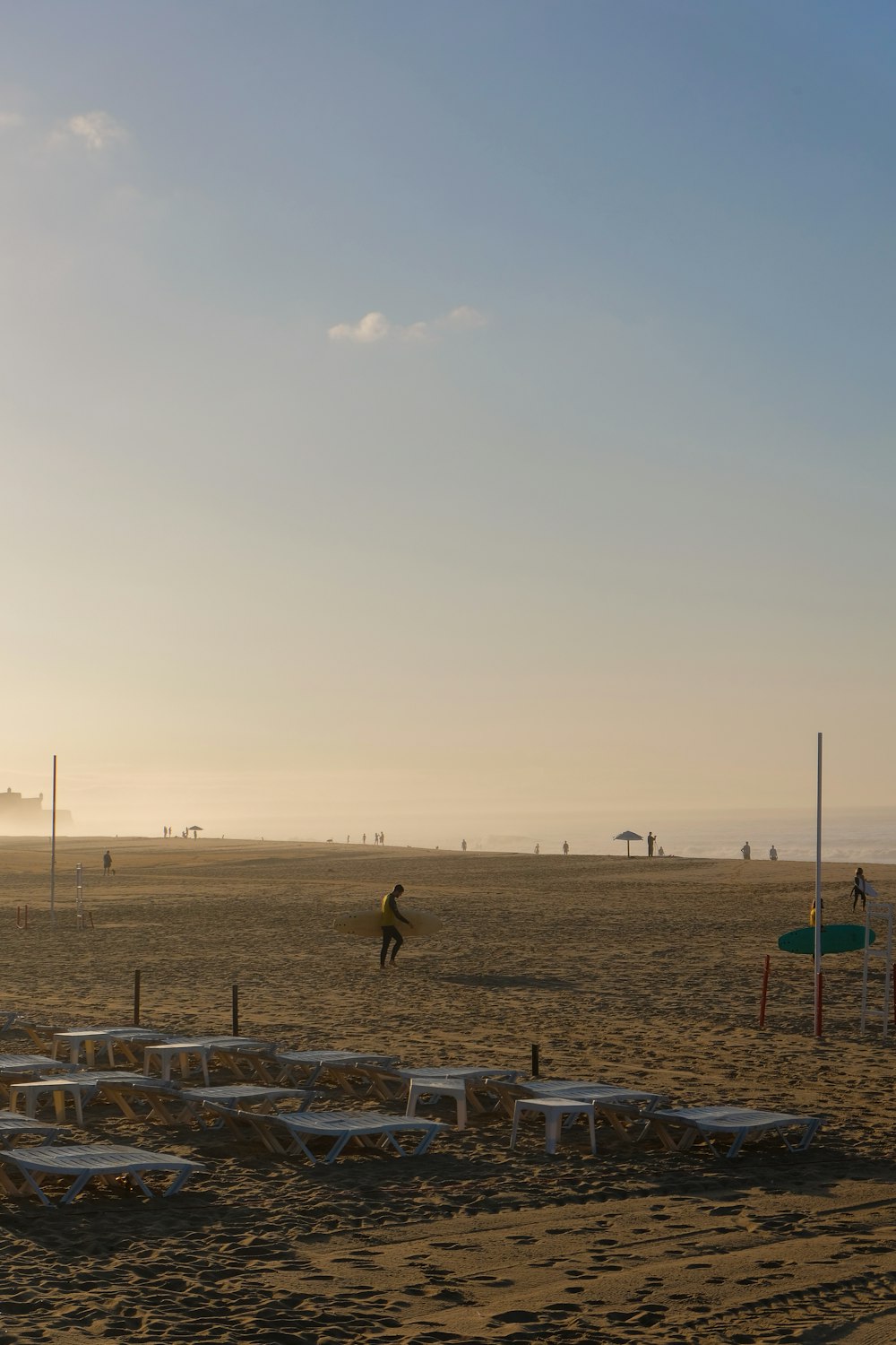 a person is flying a kite on the beach