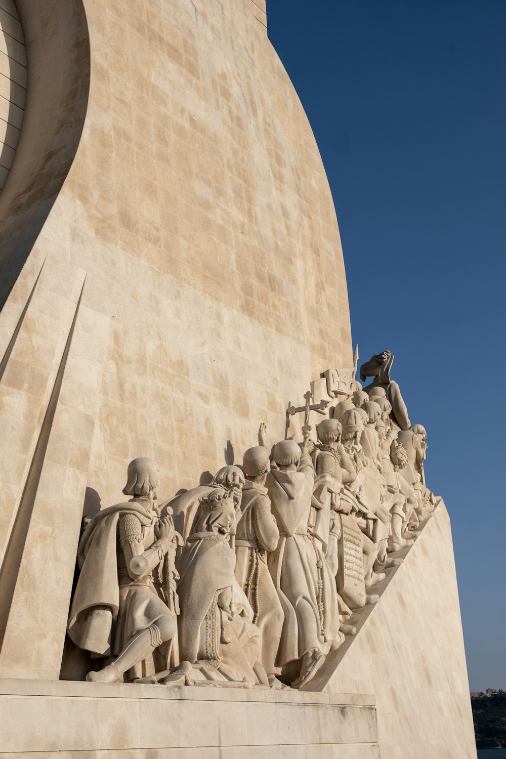 a monument with a bunch of statues on it