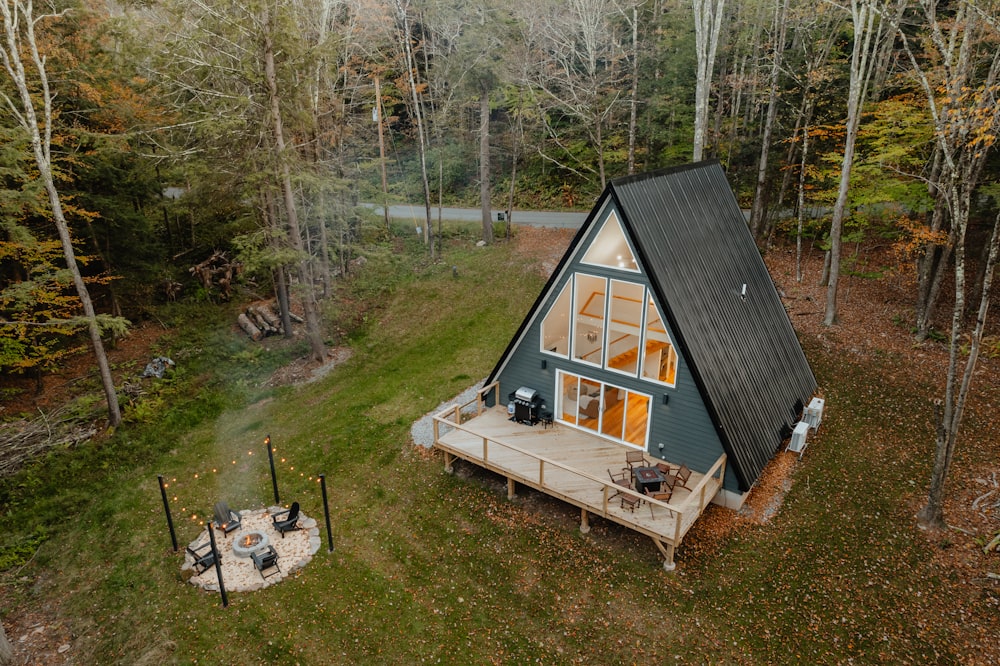 a small cabin in the middle of a forest