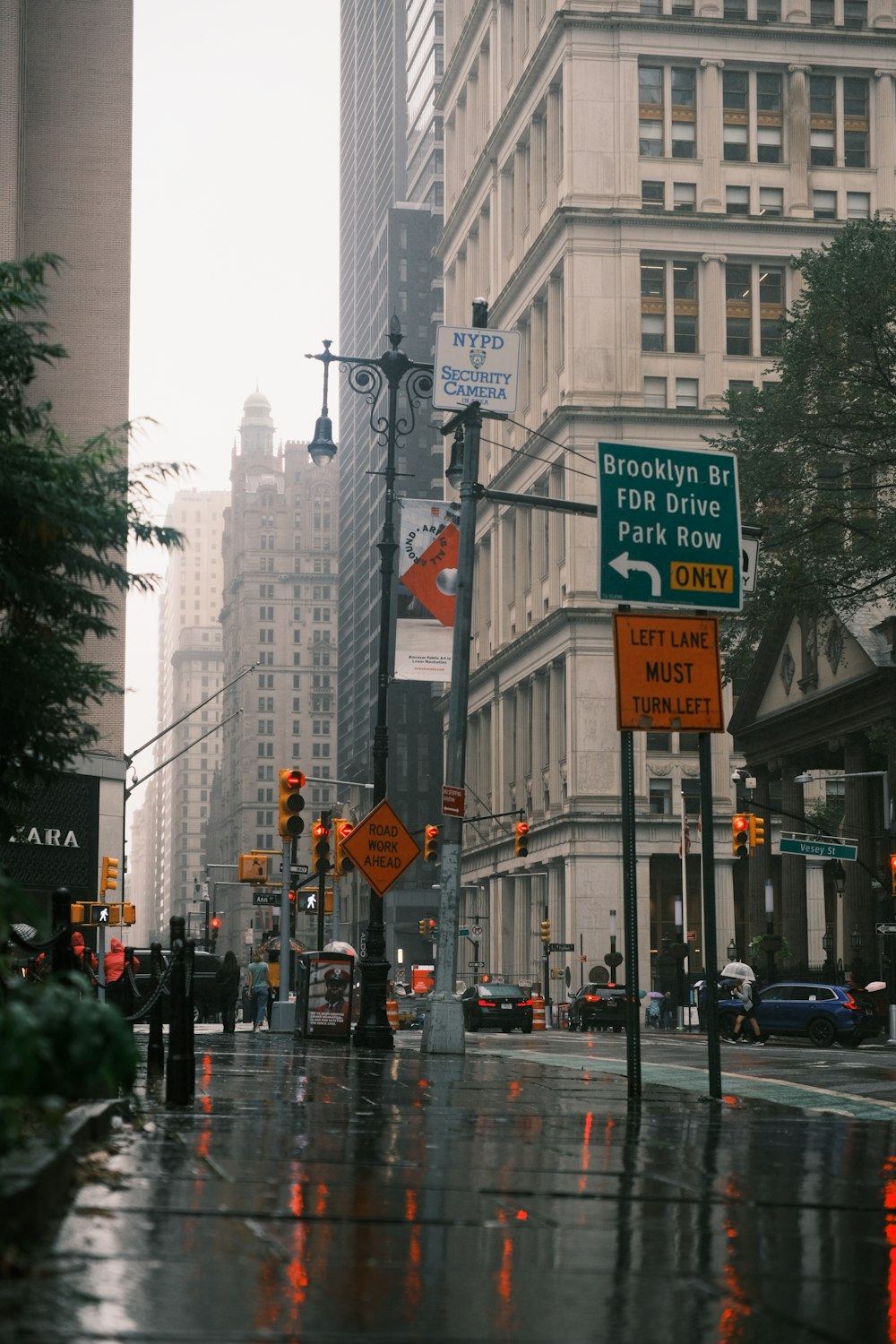 a city street with lots of tall buildings