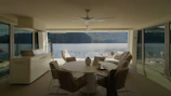 Spacious living area in the Lake View room with modern decor and lake views.
