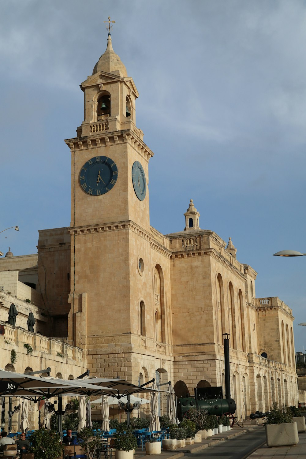 a large building with a clock on the front of it