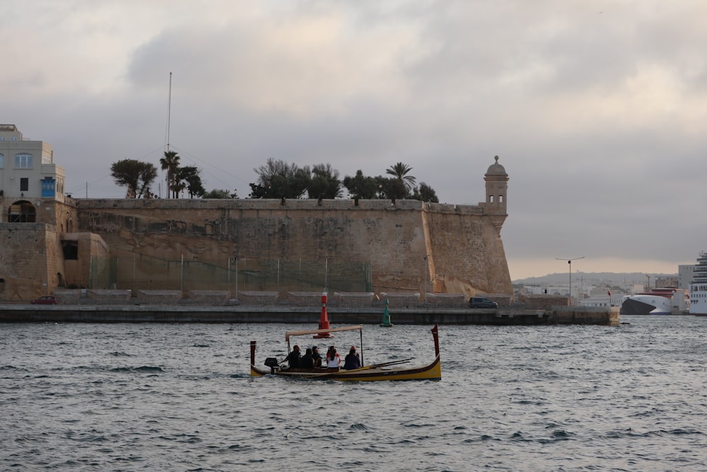 a small boat in a body of water