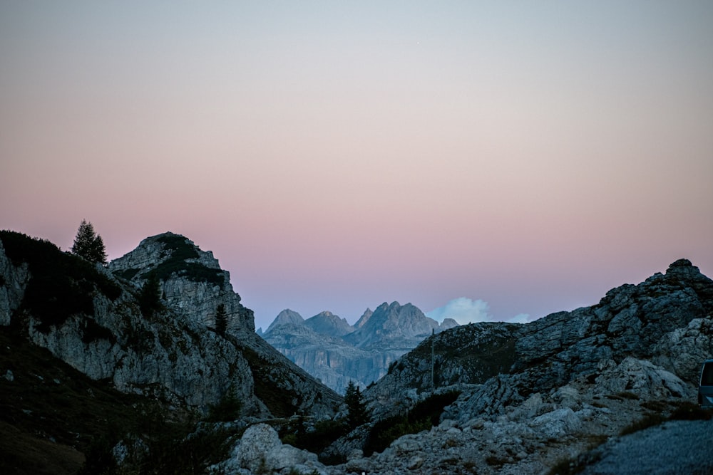 a view of a mountain range at dusk