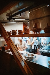 a kitchen filled with lots of pots and pans