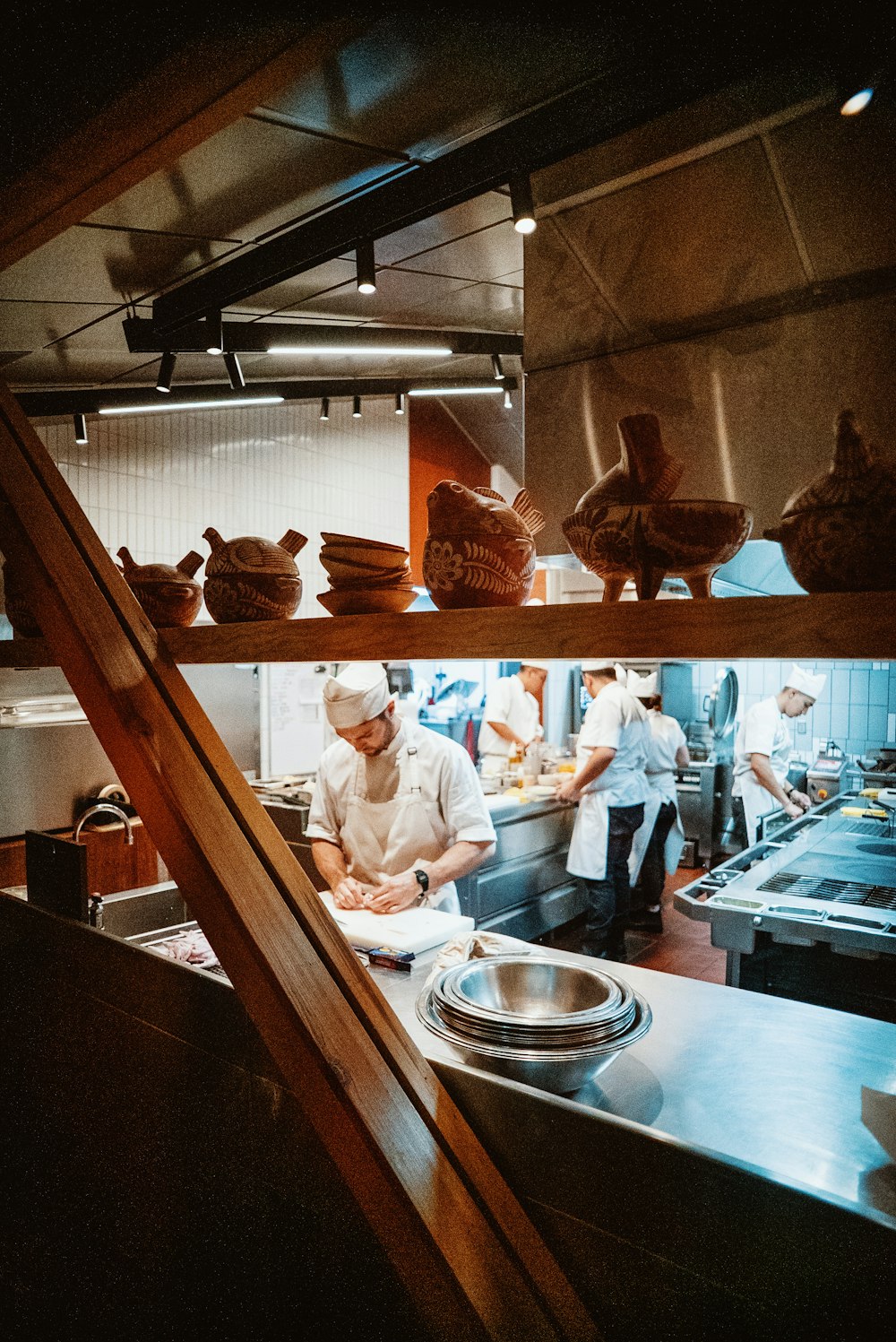 a kitchen filled with lots of pots and pans