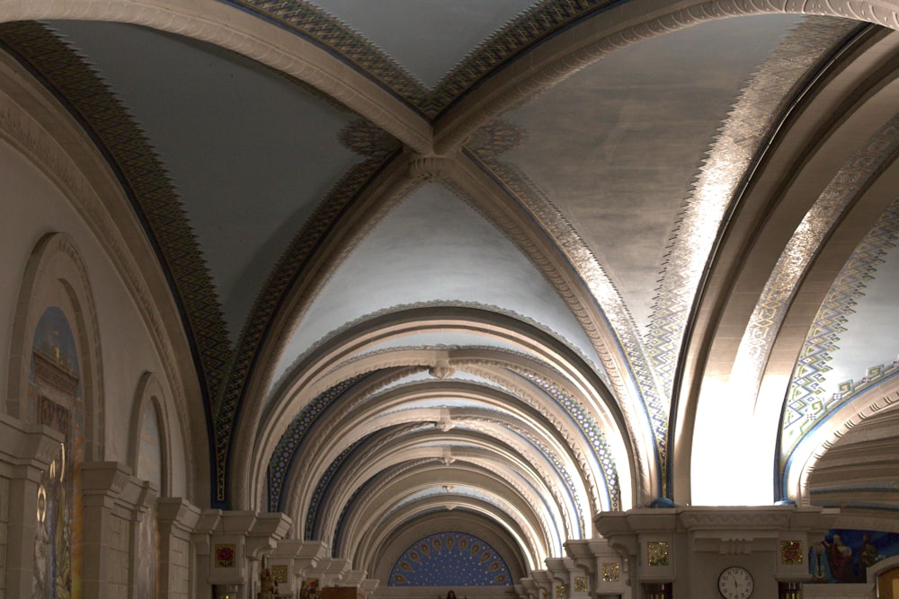 a large cathedral with a clock on the wall