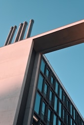 a tall building with a clock on the side of it
