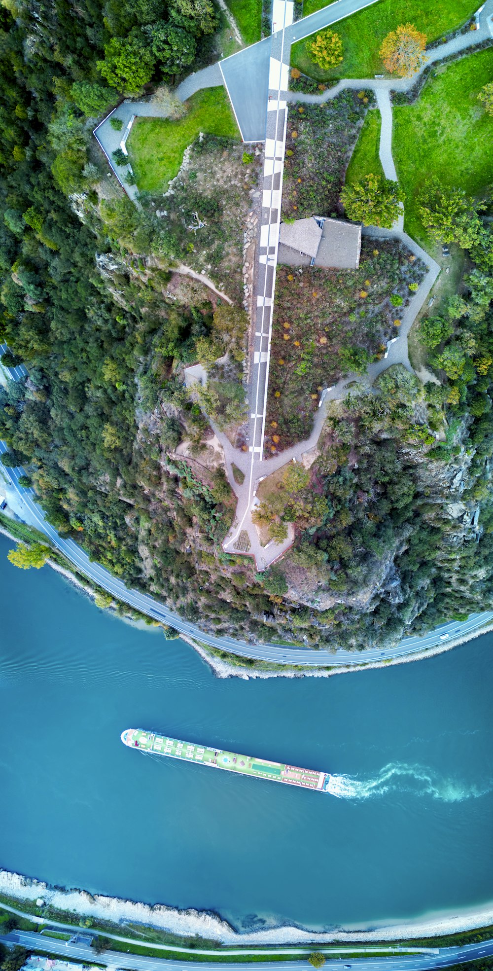 an aerial view of a bridge over a body of water