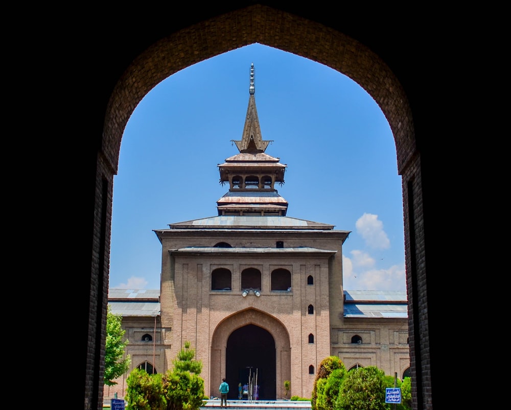 a view of a building through an archway