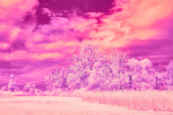 A surreal, glitchy dreamscape with floating eyes and melting clocks under a neon pink sky.