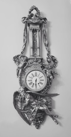 Classic floor clock with a polished finish and ornate details.