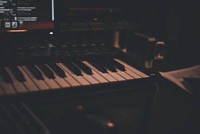 A cozy studio corner featuring a vintage keyboard and headphones.