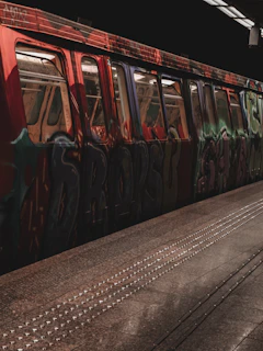 A vibrant metro train exterior showcasing bold transit branding designed by Dinka Creations.