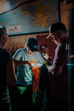 A warm photo of Alejandra and Rodolfo planning a personalized travel itinerary with a client.