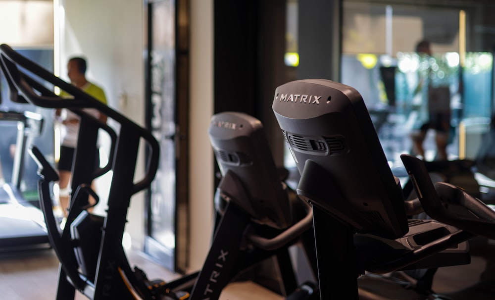 a row of treads in a gym with people in the background